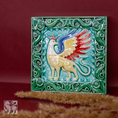 Изразец Грифон цветной зеленый фон фото