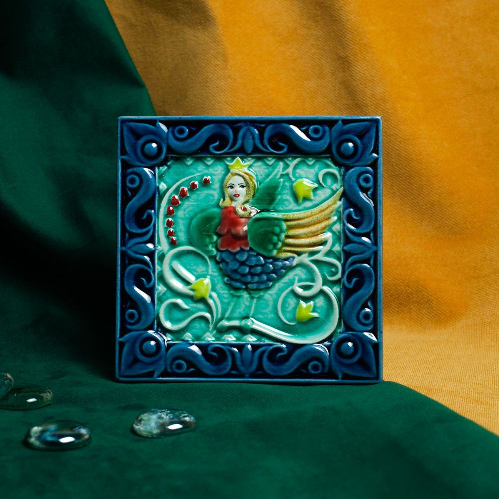 Изразец Сирин цветной синий фон фото