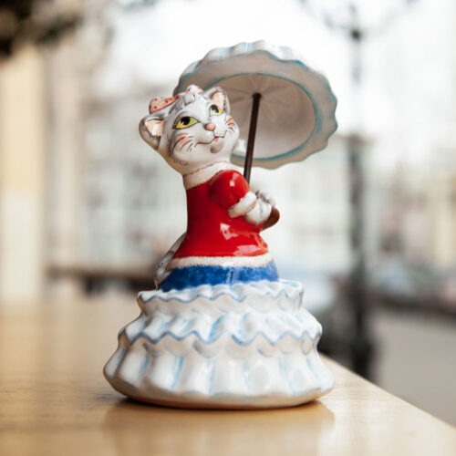 Кошка с голубым зонтиком Кошка с голубым зонтиком фото