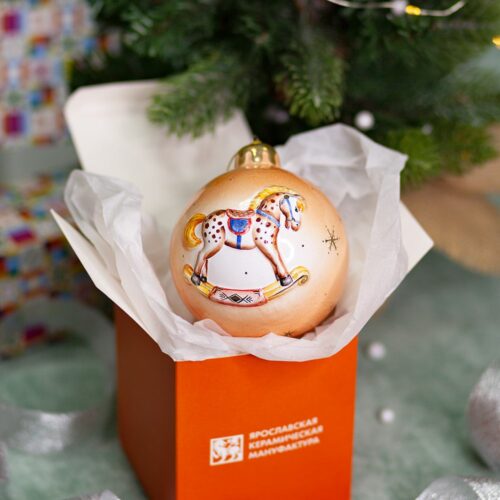 Шар оранжевый с игрушками (лошадка, паровоз) фото